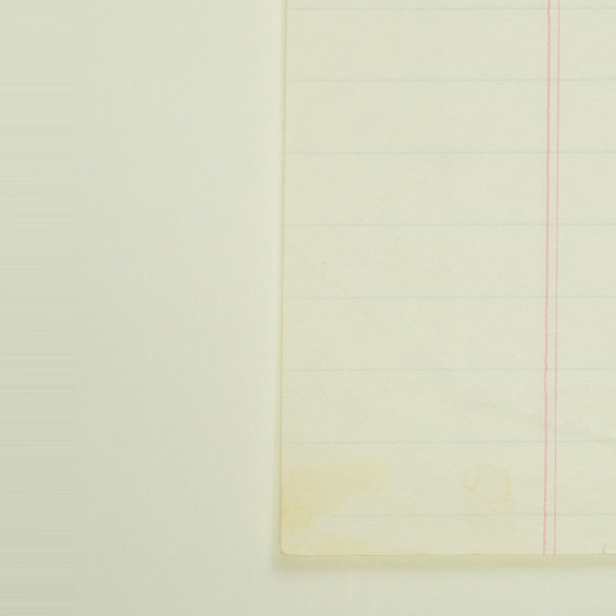 Detail of “Everything's Coming Up Roses”: a worn, softly stained corner of the sheet