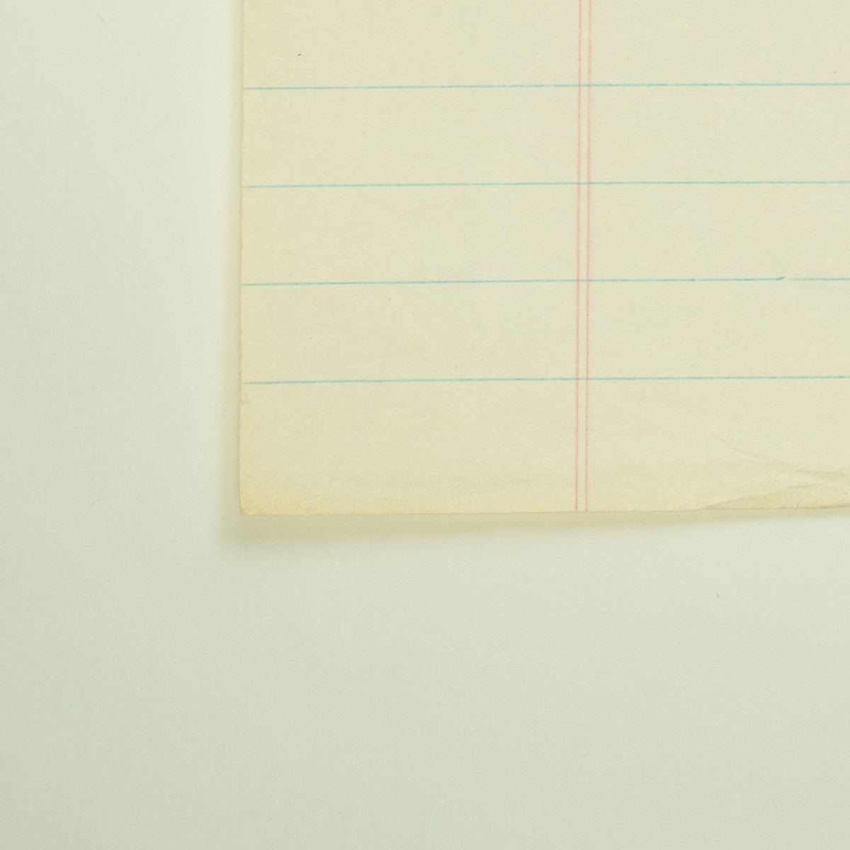 Detail of “Diamonds Are a Cape's Best Friend”: a curled, worn corner of the sheet